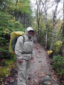 Dennis decked out in Frogg Toggs rain gear and his pack